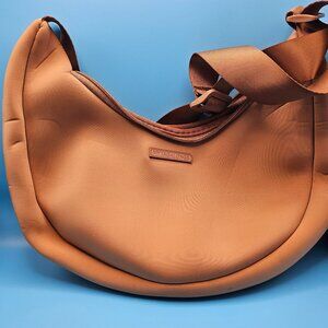 MyTagAlongs Crescent Neoprene Cross‑Body Bag – Camel (Tan)